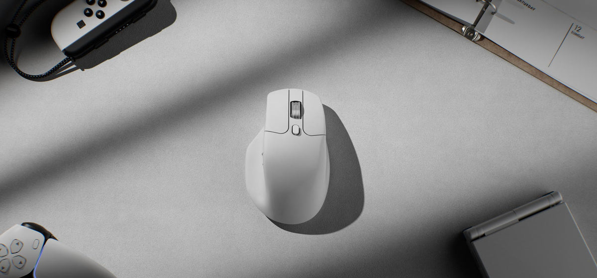 White Keychron M6 Premium Wheel on a light desk