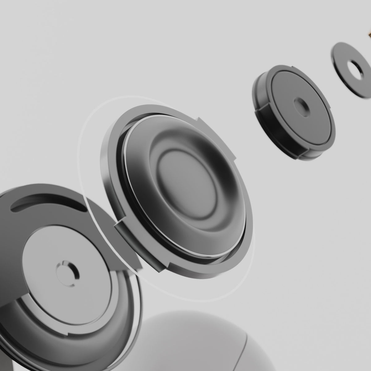 A clip earbud opening into an exploded driver and diaphragm assembly