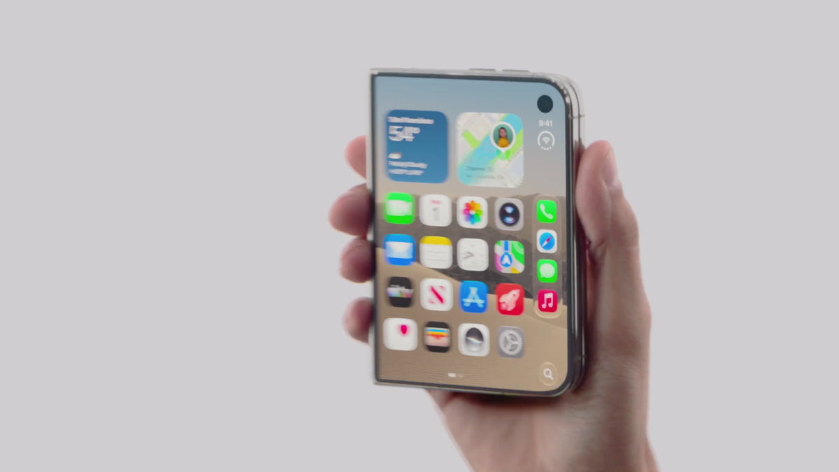 John Ternus holding iPhone Duo on stage