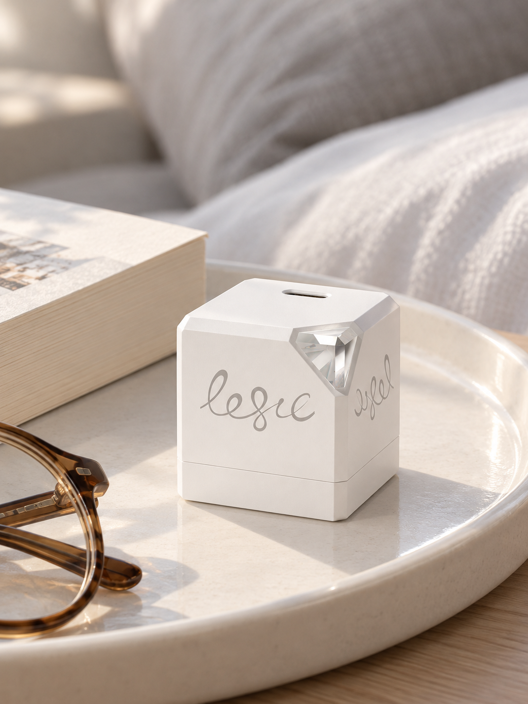 Reference-based bedside scene with the ACADEMY charger beside reading objects.