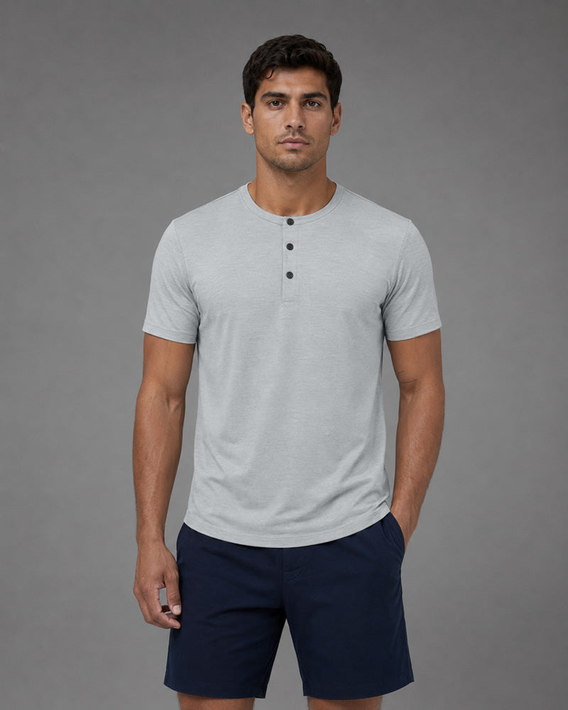 Front view of the Overcast light grey Henley, showing its snap neckline and curved hem.