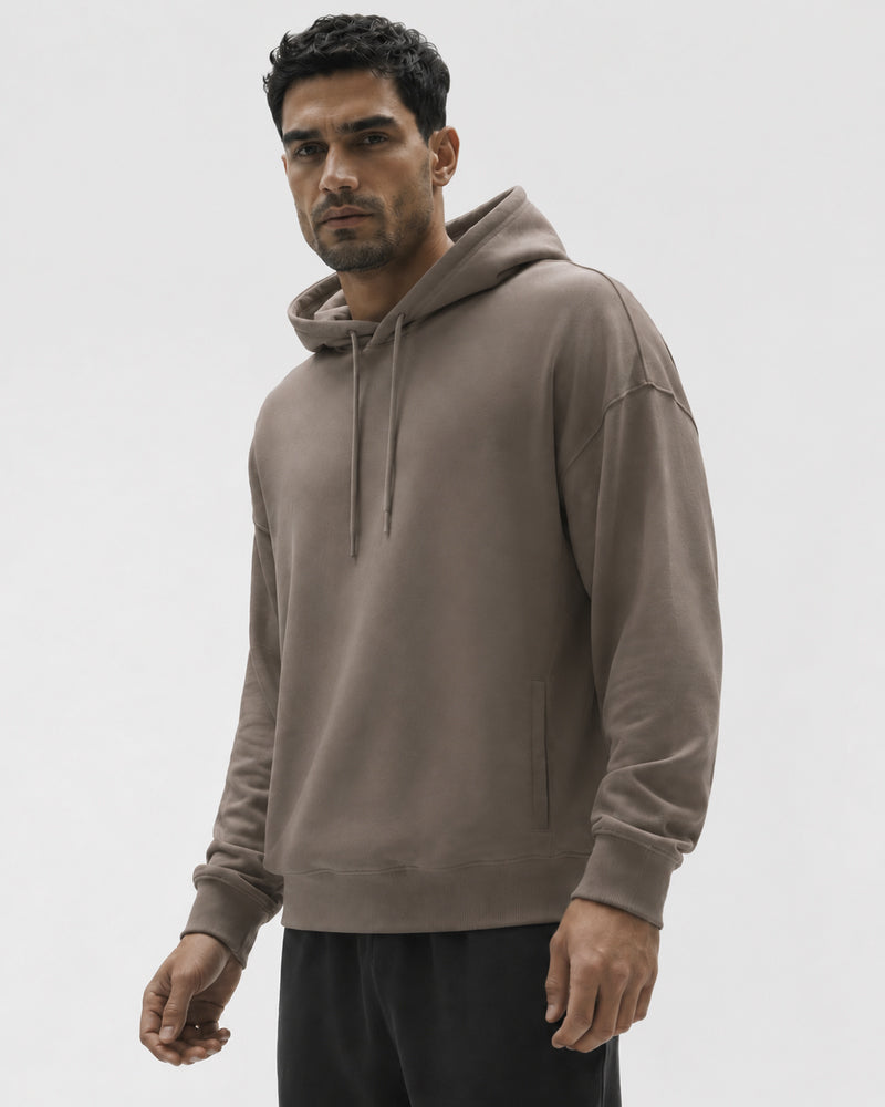 Three-quarter view of the TexTale Rain-Repel Hoodie in Dune